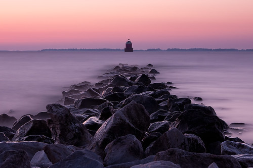 longexposure morning lighthouse water sunrise dawn bay rocks soft jetty maryland tranquility chesapeake chesapeakebay sandypoint