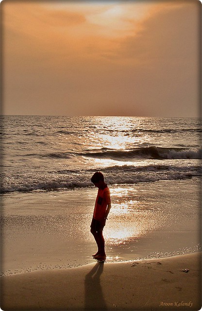 Marking his footsteps....My son at calicut Beach..