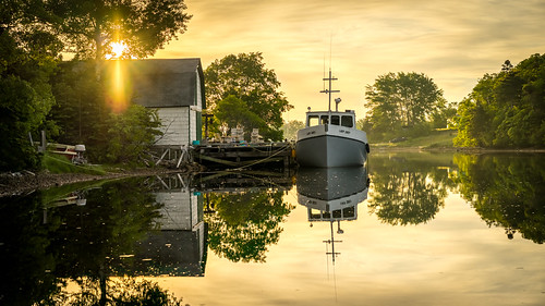 Sleeping in by Jon Bush, Sunrise at Dingwall Harbor on Aspy Bay, Cape Breton Island, Nova Scotia.canada sunrise harbor boat n