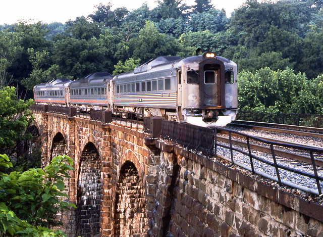 Maryland Area Rail Commuter (MARC) Budd RDC's seen on the Thomas Viaduct as the train travels along the double track CSX mainline (originally B&O) to Baltimore, Maryland, August 1988