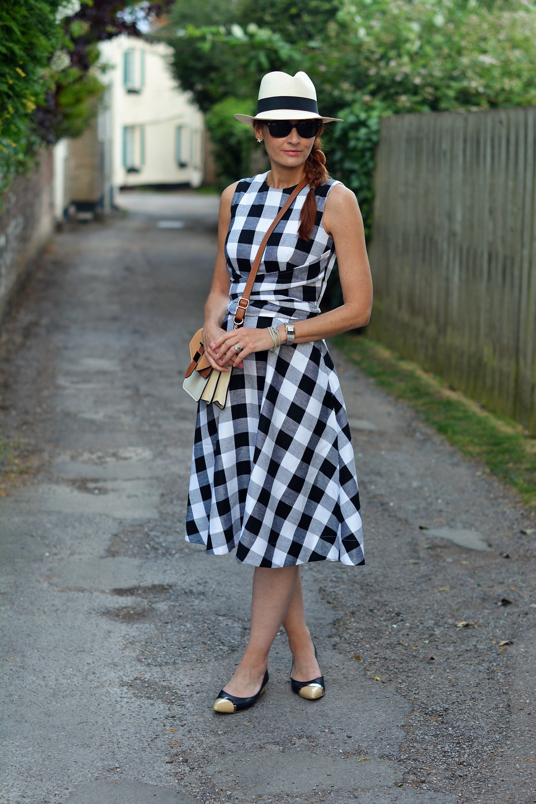 Not Dressed As Lamb | Fit-and-flare black and white gingham dress, Panama hat, pointed flats