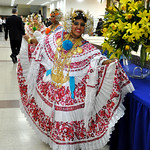 Panamanian woman in national costume greets participants to 