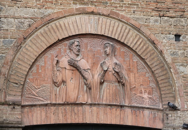 Carving on door of San Domenico, Siena