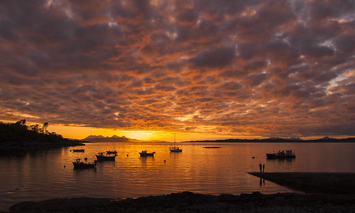 sunset sea west skye scotland fishing day cloudy atlantic shore fishingboats rhum eigg glenuig