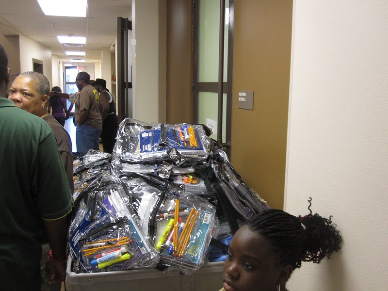 Volunteers packed supplies into hundreds of backpacks especially prepared by grade level.