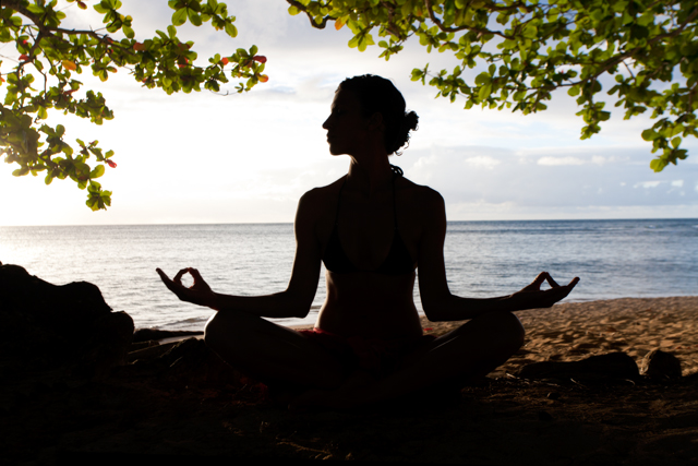 woman meditating, Hawaii, Kauai, tropical woman peacefully …