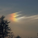 Barevné parhelium tvořící se ve vysokých řasovitých oblacích bylo zaznamenáno 15. března 2008 v podvečer nad Rajhradem Canonem EOS 300D. , foto:  Iva Ondráčková