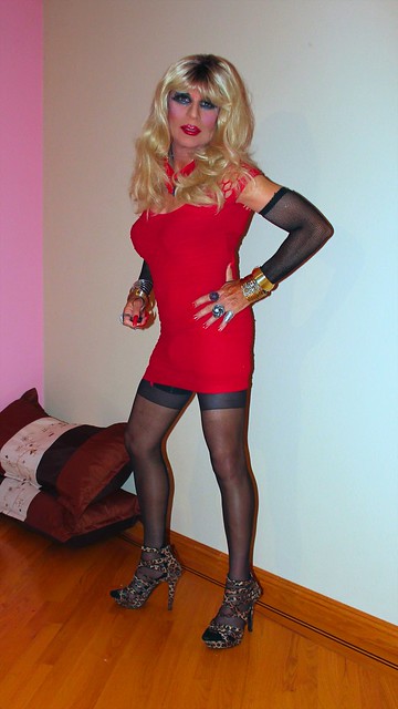 Cortney - Blonde with red dress, long red nails and very dark eye makeup