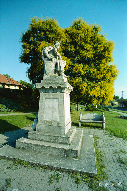 Statue with tree