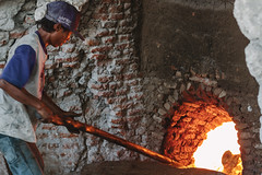 Tending to Fire in Kiln, Java Indonesia