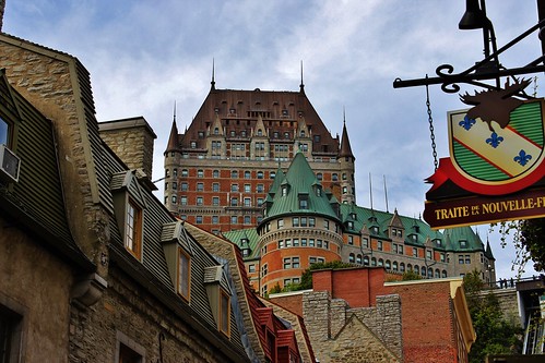 old city travel trees sky canada green sign architecture clouds canon buildings eos rebel scenery view quebec peaceful historic québec copper daytime quebeccity chateaufrontenac tranquil t3i québeccity fairmontlechâteaufrontenac copperroof 600d waltphotos lordwalt kissx5 architectbruceprice canonlensefs1855mmf3556isii