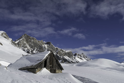 barn beautyinnature cloud sky coldtemperature day landscape mountain mountainpeak mountainrange nature nopeople outdoors scenics snow snowcapped mountaintranquilscene tranquility winter