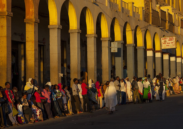 People Waiting For A Bus In Front Of The Arcades, Asmara, Eritrea