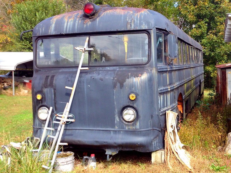 Rare 1958 Thomas Built Bus.  This former bus is a transit -style, front-engine gasoline-burner being used as a storage shed in NC.