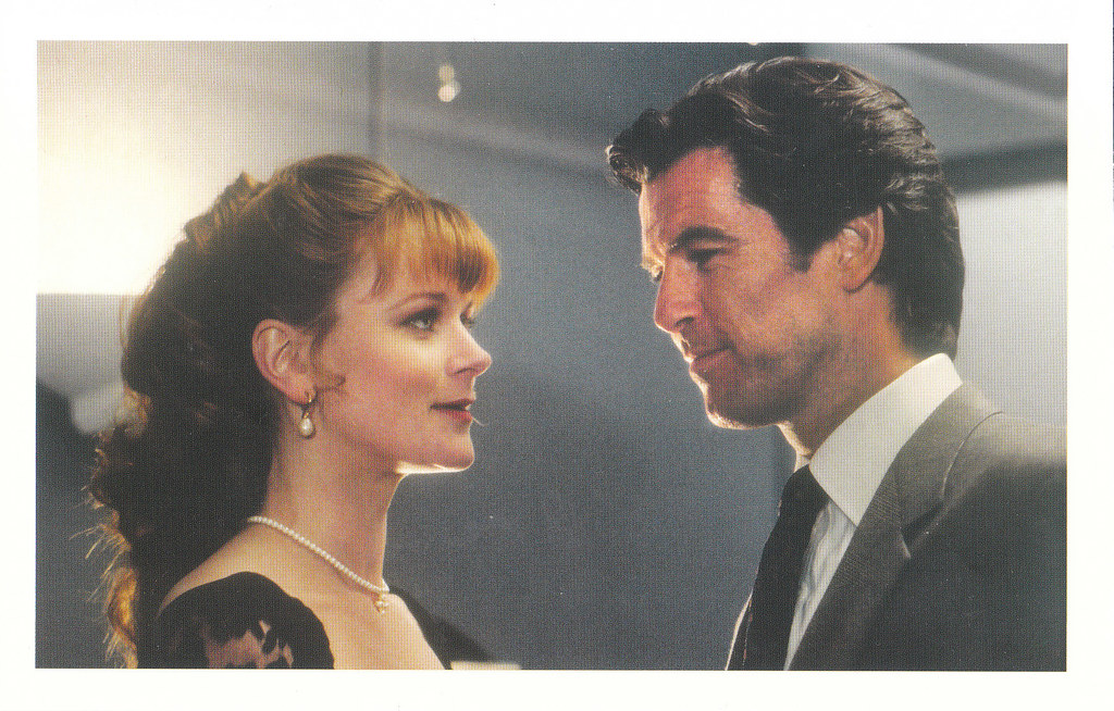 Pierce Brosnan (James Bond) and Samantha Bond (Miss Moneypenny) in GOLDENEYE (1995).