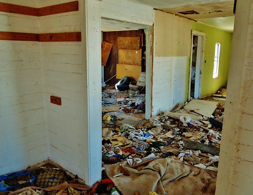 Drug Den Detritus by rickele, The abandoned Henning Motel sits in ruin by old Route 66 in Newberry Springs, CA. Only the three uni