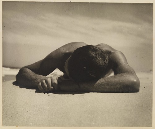 Harold Salvage sunbaking, "The Sunbather" from Camping trips on Culburra Beach by Max Dupain and Olive Cotton
