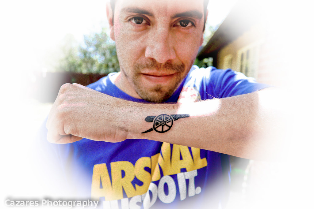 Arsenal FC Supporter fan with Tattoo on Arm and Back Stock Photo  Alamy
