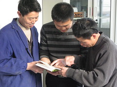 Reading our book on green teas to Mr. Xie
