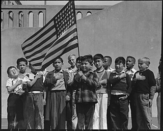 San Francisco, California. Flag of allegiance pledge at Raphael Weill Public School, Geary and Buch . . ., 04/20/1942