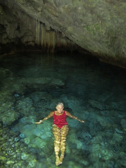 Bermuda Grotto Bay Beach Hotel. Guest's underground cave swimming area.  Anne enjoys a dip.