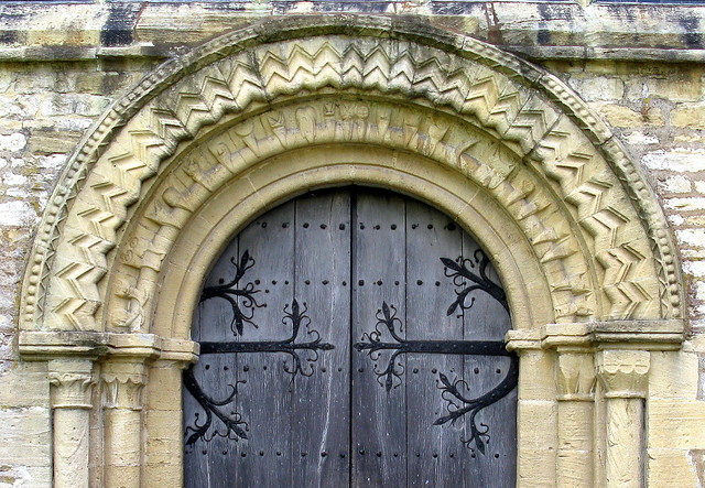 The west doorway (c.1175), the Church of St John the Baptist, Burford, Oxfordshire, England