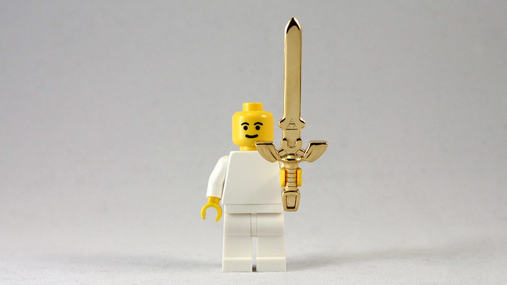 3D printed gold lego master sword.