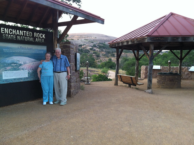 Mom and Dad Next to Enchanted Rock Sign