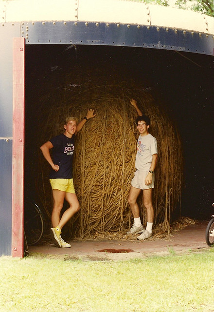 Sean and Chris pose with the twine ball which measures about 40 feet in circumference.