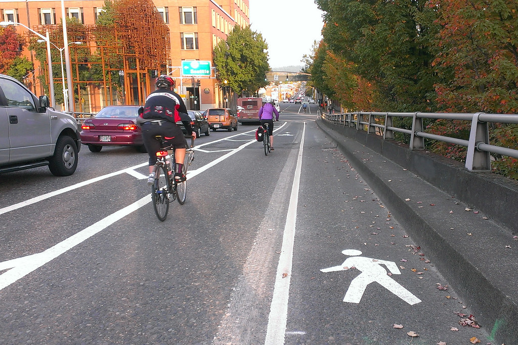 buffered bike lane on left, and right bike lane becomes a … | Flickr