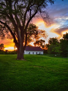 Sunset above one of the barns