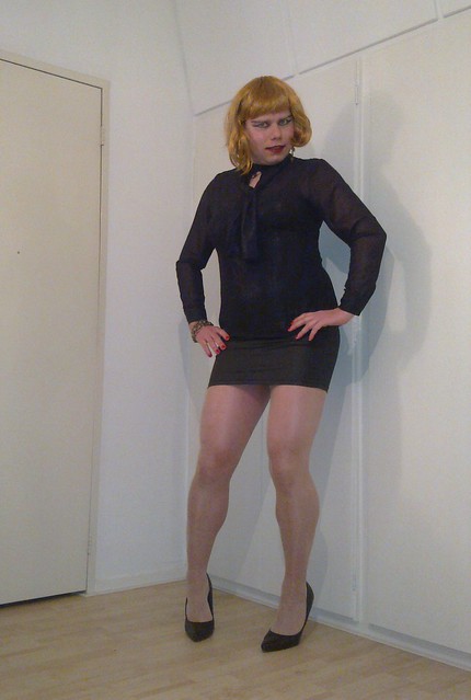 black top and miniskirt again, now with pumps and lighter nylons