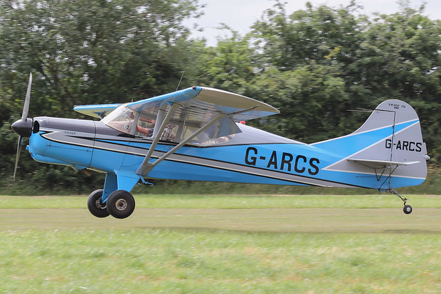 G-ARCS - 1960 build Auster 6 Series 180, arriving on Runway 08 at Stoke Golding for the 2013 Stakeout