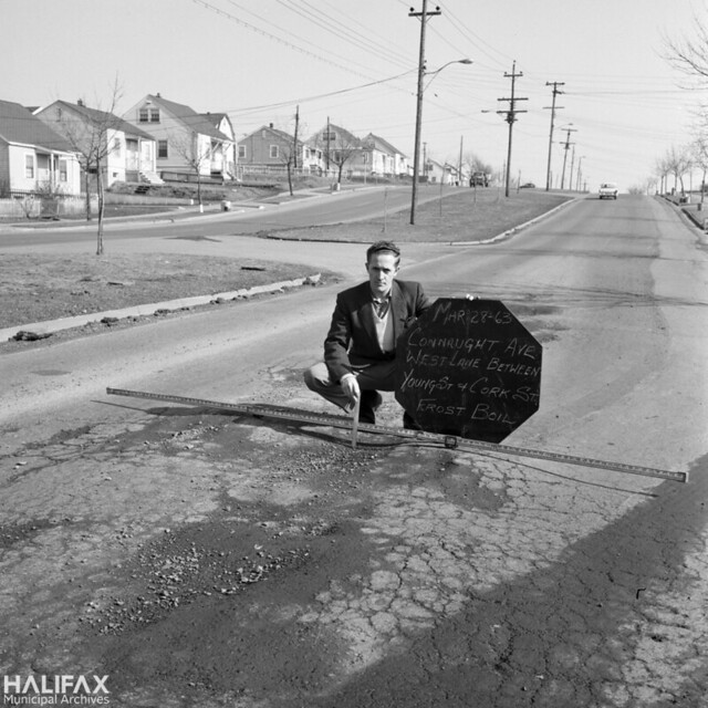 Measuring potholes, Connaught Ave.