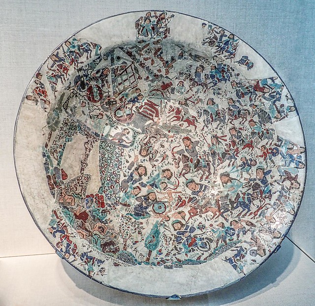 Bowl depicting a battle Iran early 13th century CE Composite body with painted enamel