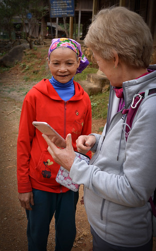 Glennis showing the Lady we met in Mai Chau village her photo's by Piktour | Neville Wootton, * * * * * * * *

Vietnam was our original choice for a touring holiday back in 2015, mainly to see H
