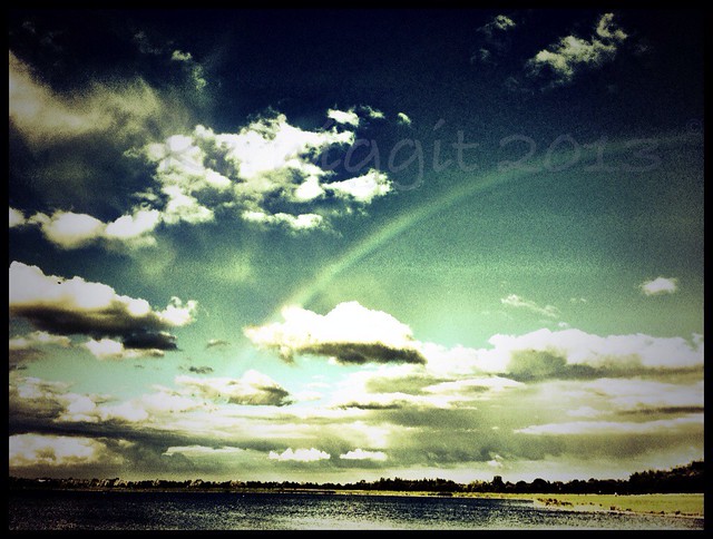 Rainbow in a Blue Sky