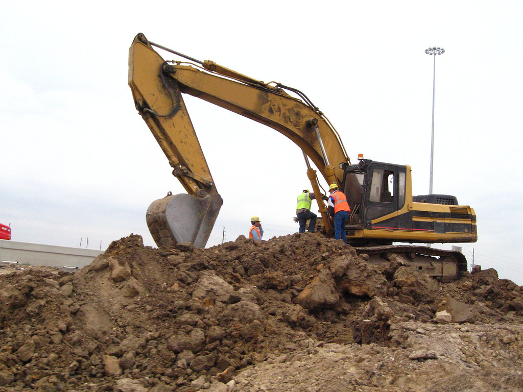 Cat Excavator | Cat Excavator doing construction road work o… | Flickr