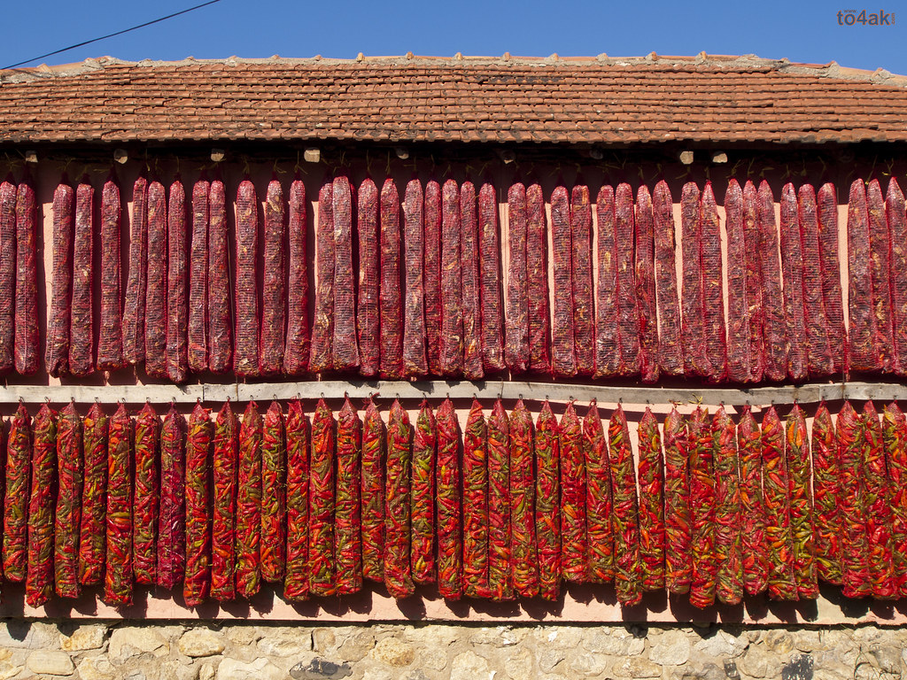 red peppers hanging in a net | Bistrica, a village all in re… | Flickr