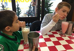 Alex and Gabriel drink milkshakes at Main St. Soda Grill