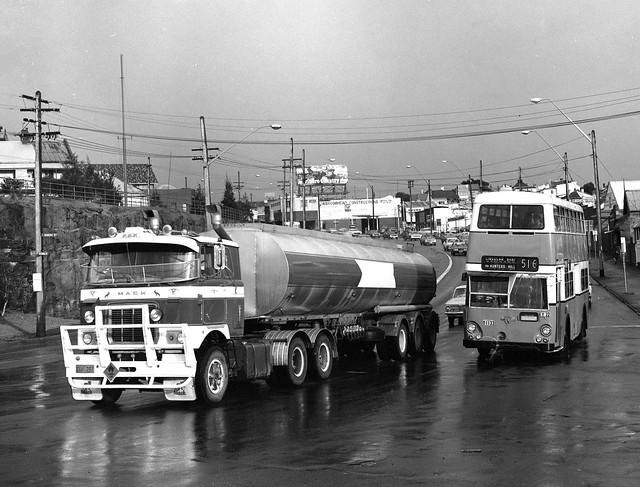 I.D.s 687 & 27107 photographed by John Ward on 1979-02-00 of Mack FR700 semi trailer (Tanker) TIH-797 & Public Transport Comission Leyland Atlantean 1133 in Victoria Road at Robert Street, White Bay, Sydney, N.S.W. Australia.