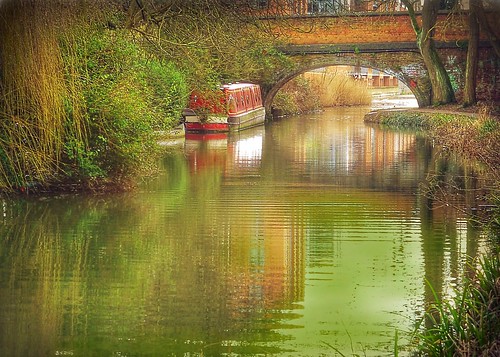 canal landscape water waterway bridge green nature reflection boat