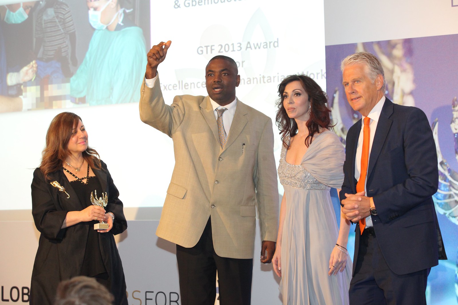 Professionals for Humanity (PROFOH) receiving GTF 2013 Award for Excellence in Humanitarian Work, Reem N. Bsaiso, Elizabeth Filippouli, Stephen Cole