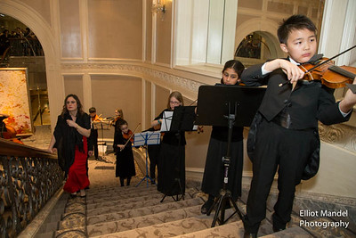 Preparatory String Students line the Grand Staircase