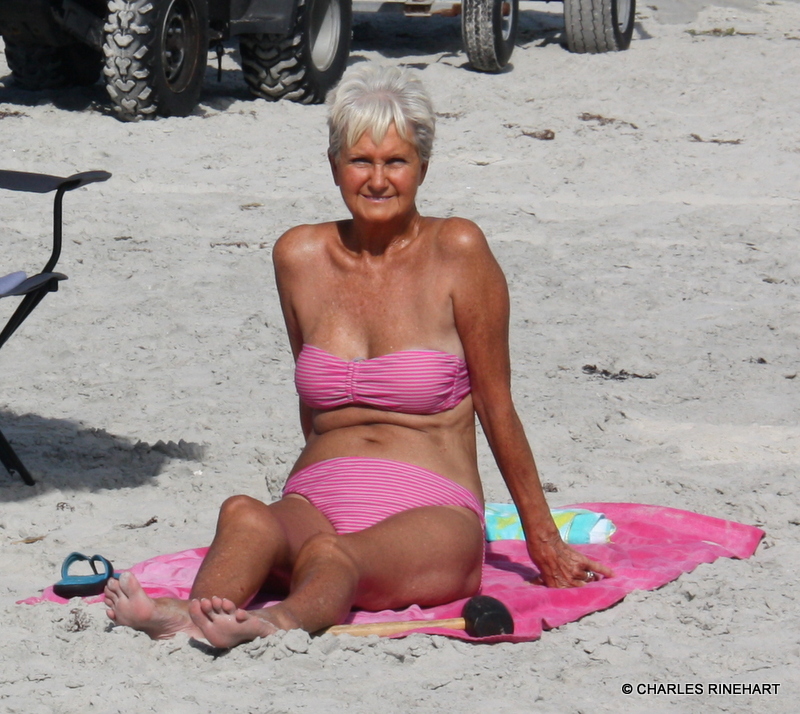 Mature Granny On The Beach by Charles Michael Rinehart. 