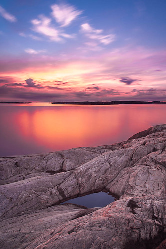 ocean longexposure sunset sea sky cliff sun reflection rock clouds mirror dof sweden pov nd bohuslän grundsund ndfilter nd16