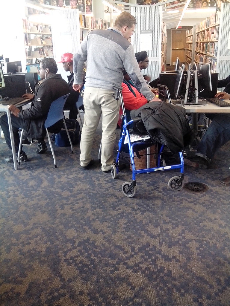 Flickr Helpling Helping a library patron | Jason Alredge | Flickr