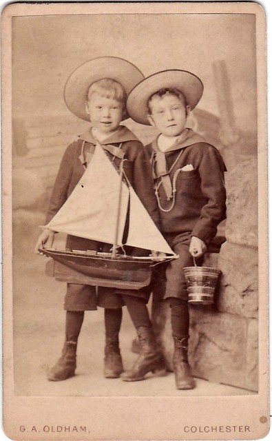1900 CDV TWO VICTORIAN LITTLE BOYS WITH A MODEL POND YACHT  BY OLDHAM COLCHESTER