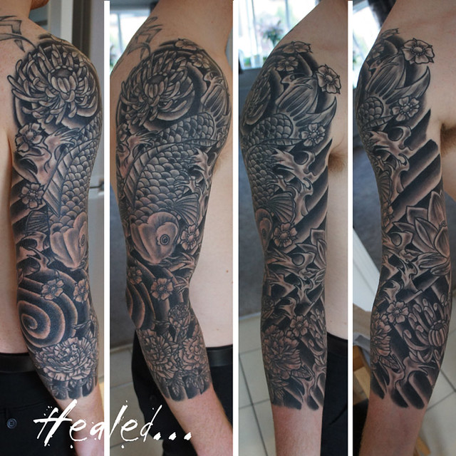 Japanese koi three quarter sleeve tattoo