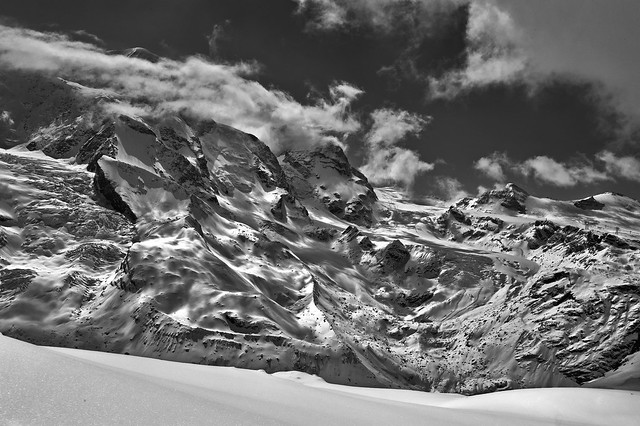 The Klein Matterhorn (3, 883 alt. ) the Breithorn under clouds  , the Theodulgletscher and the Theodul pass. A view from the train to Gornergrat .Zermatt , Switzerland. No. 4208.